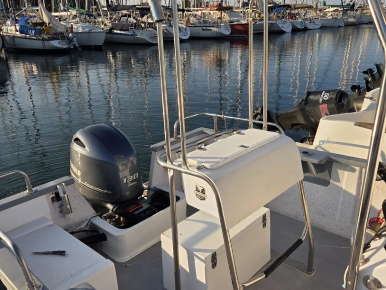 Pronajmout si Pro2000 Open 6000 v Saint-Cyprien-Plage