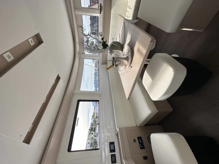 Pronajmout si Lagoon Lagoon 46 v Cugnana Verde