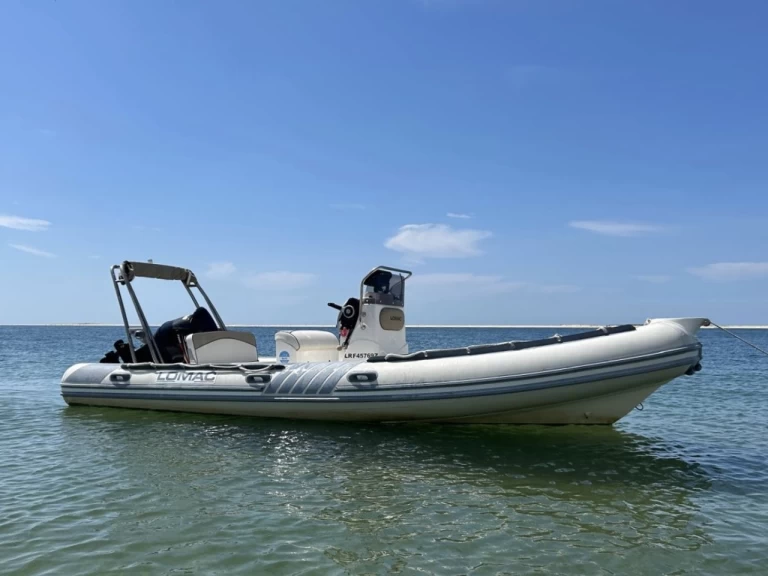 Pronajmout si Lomac Lomac 600 IN v Grand Piquey